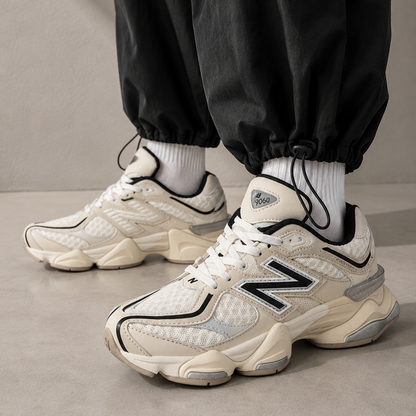 New Balance 9060 Turtledove Black worn on foot